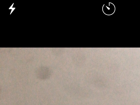 iPhone X拍照出现斑点怎么回事？